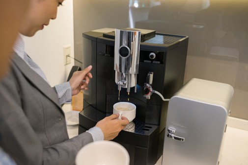 Office coffee machines brewing more than coffee grounds