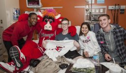 Chicago Bulls players and Benny the Bull brighten young spirits