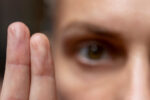 A person receiving Eye Movement Desensitization and Reprocessing (EMDR) therapy.