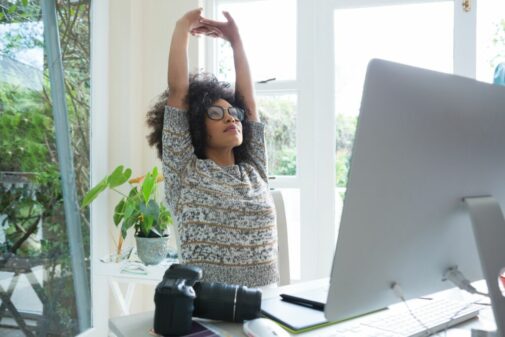 Stressed at work? Try desk yoga.