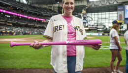 Breast cancer patient receives a pink carpet treatment at the ballpark