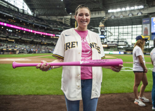 Breast cancer patient receives a pink carpet treatment at the ballpark