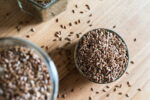 The healthy superfood flaxseed, which has many health benefits, on a kitchen countertop.
