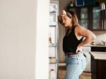 A woman who isn't eating foods that naturally boost GLP-1 is hungry.