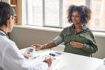 A pregnant woman with preeclampsia learns if she needs preventive thromboembolism treatment.
