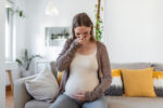 A pregnant woman has morning sickness.
