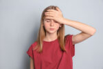 A girl with previous mild brain injury has developed a behavioral disorder as a result.
