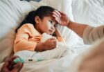 A young girl sick with walking pneumonia.