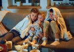 Children watching a scary movie around Halloween.