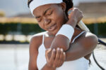 A tennis player experiences a common sports injury.