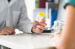 A patient has to provide a urine sample to rule out bladder cancer.