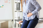 A woman has irritable bowel disease that increases her risk for colorectal cancer.