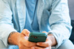 A man scrolling social media.