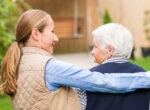 A daughter takes care of parent with dementia as cases rise.