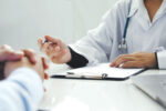 A man learns his prostate cancer Gleason score from doctor.