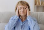 A woman has symptoms of normal pressure hydrocephalus (NPH).