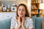 A woman has swollen lymph nodes.