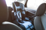 An infant car seat in a car.