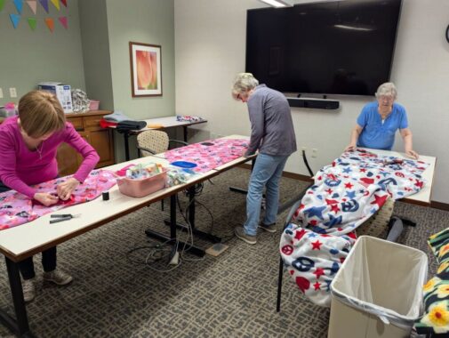 Volunteers create radiation capes for cancer patients